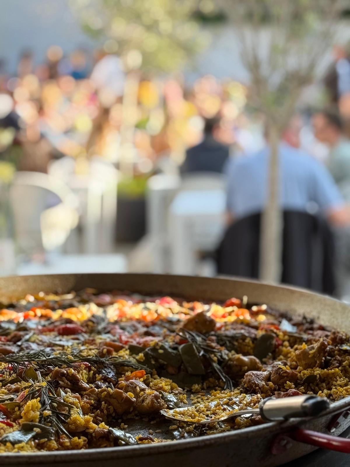Valencian paella with rosemary, meat and peppers